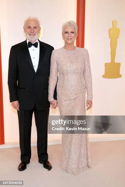 Christopher Guest and Jamie Lee Curtis attend the 95th Annual Academy Awards on March 12, 2023 in Hollywood, California.