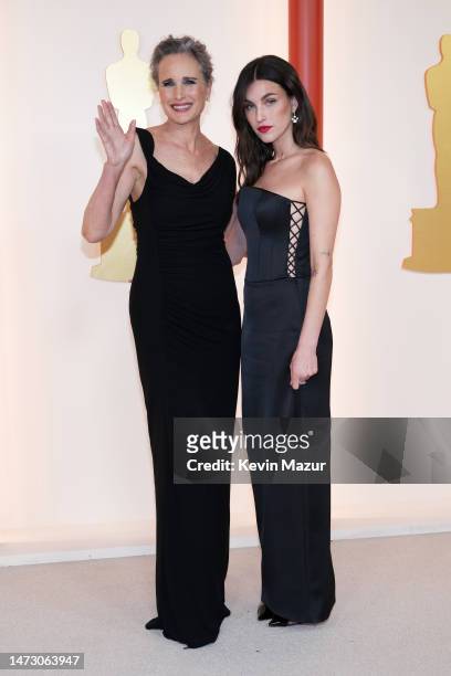 Andie MacDowell and Rainey Qualley attend the 95th Annual Academy Awards on March 12, 2023 in Hollywood, California.