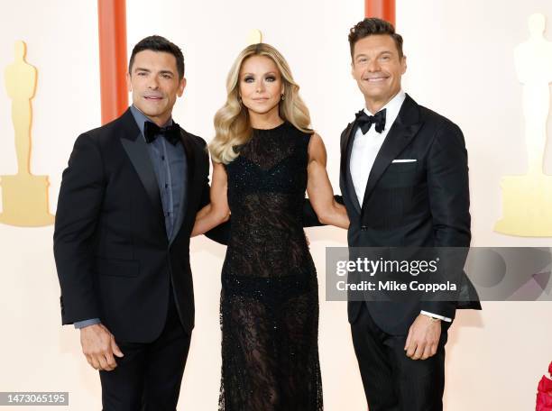 Mark Consuelos, Kelly Ripa and Ryan Seacrest attend the 95th Annual Academy Awards on March 12, 2023 in Hollywood, California.