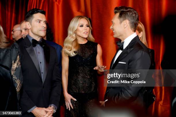 Mark Consuelos, Kelly Ripa and Ryan Seacrest attends the 95th Annual Academy Awards on March 12, 2023 in Hollywood, California.