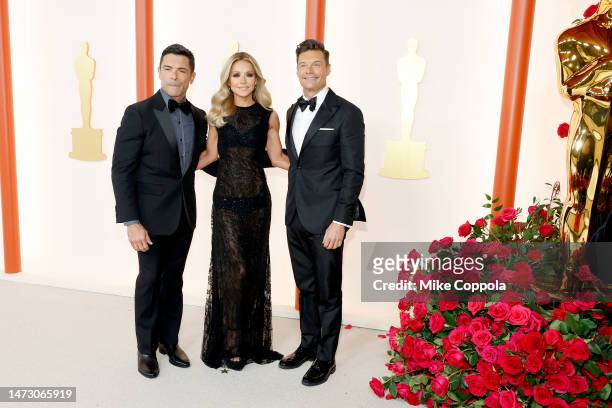 Mark Consuelos, Kelly Ripa, and Ryan Seacrest attend the 95th Annual Academy Awards on March 12, 2023 in Hollywood, California.