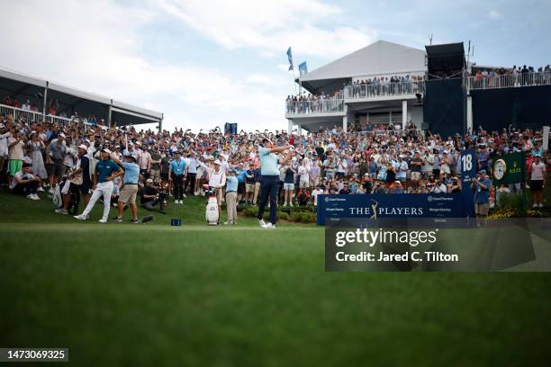 General view is seen as Scottie Scheffler of the United States plays his shot from the 18th tee during the final round of THE PLAYERS Championship on...