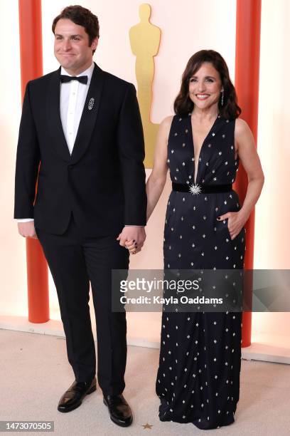 Henry Hall and Julia Louis-Dreyfus attend the 95th Annual Academy Awards on March 12, 2023 in Hollywood, California.