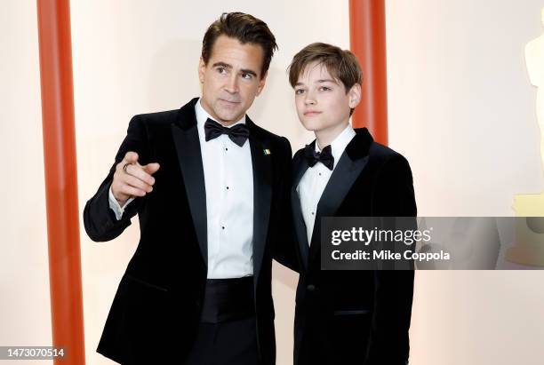 Colin Farrell and Henry Tadeusz attend the 95th Annual Academy Awards on March 12, 2023 in Hollywood, California.