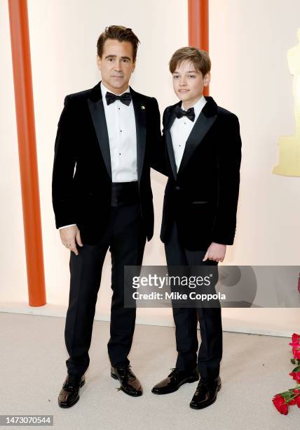 Colin Farrell and Henry Tadeusz attend the 95th Annual Academy Awards on March 12, 2023 in Hollywood, California.