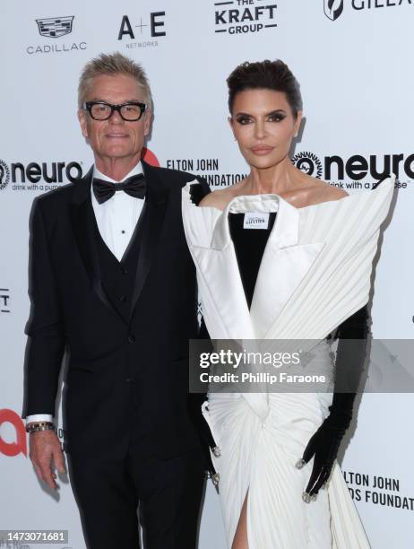 Harry Hamlin and Lisa Rinna attend Elton John AIDS Foundation's 31st annual academy awards viewing party on March 12, 2023 in West Hollywood,...
