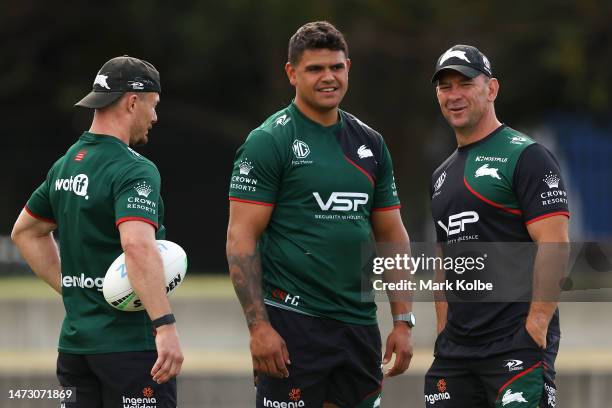 Damien Cook and Latrell Mitchell speak to a Rabbitohs head coach Jason Demetriou during a South Sydney Rabbitohs NRL training session at Redfern Oval...