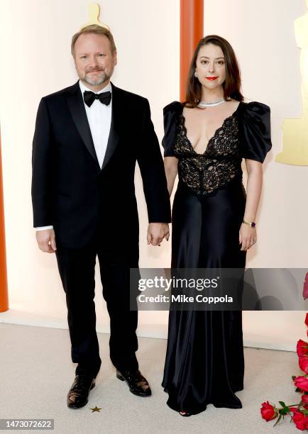 Rian Johnson and Karina Longworth attend the 95th Annual Academy Awards on March 12, 2023 in Hollywood, California.