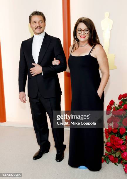 Pedro Pascal and Javiera Balmaceda attend the 95th Annual Academy Awards on March 12, 2023 in Hollywood, California.