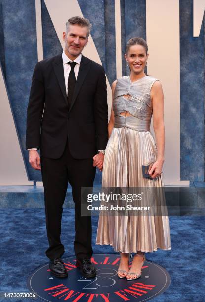 David Benioff and Amanda Peet attend the 2023 Vanity Fair Oscar Party Hosted By Radhika Jones at Wallis Annenberg Center for the Performing Arts on...