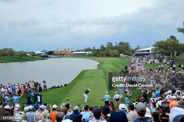 Min Woo Lee of Australia plays his tee shot on the 18th hole during the final round of THE PLAYERS Championship on THE PLAYERS Stadium Course at TPC...