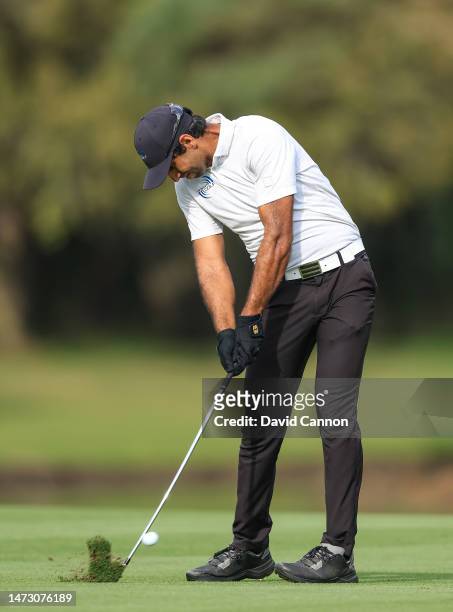 Aaron Rai of England plays his second shot on the 14th hole during the final round of THE PLAYERS Championship on THE PLAYERS Stadium Course at TPC...