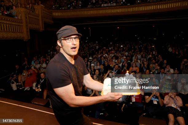 Robert Rodriguez, receives a cake on stage marking the 30th anniversary for his movie "El Mariachi" during the intro to Hypnotic screening during the...