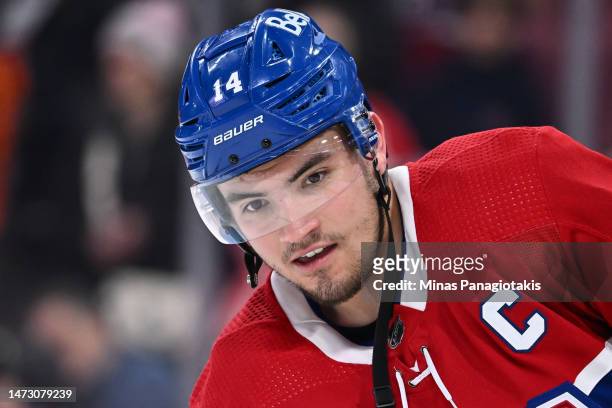Nick Suzuki of the Montreal Canadiens skates during warm-ups prior to the game against the New Jersey Devils at Centre Bell on March 11, 2023 in...