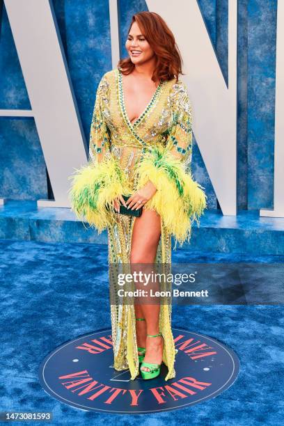 Chrissy Teigen attends the 2023 Vanity Fair Oscar Party Hosted By Radhika Jones at Wallis Annenberg Center for the Performing Arts on March 12, 2023...