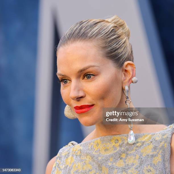 Sienna Miller attends the 2023 Vanity Fair Oscar Party Hosted By Radhika Jones at Wallis Annenberg Center for the Performing Arts on March 12, 2023...