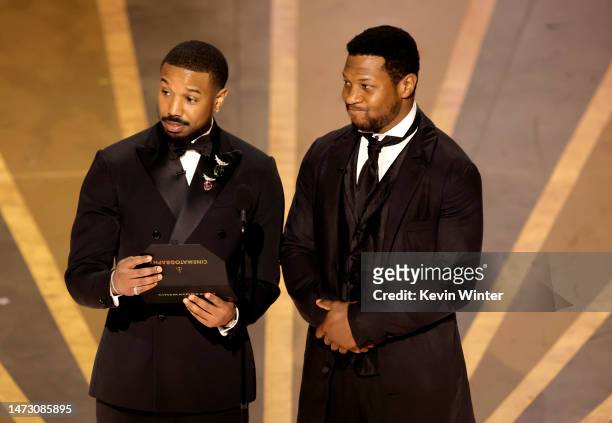 Michael B. Jordan and Jonathan Majors speak onstage during the 95th Annual Academy Awards at Dolby Theatre on March 12, 2023 in Hollywood, California.