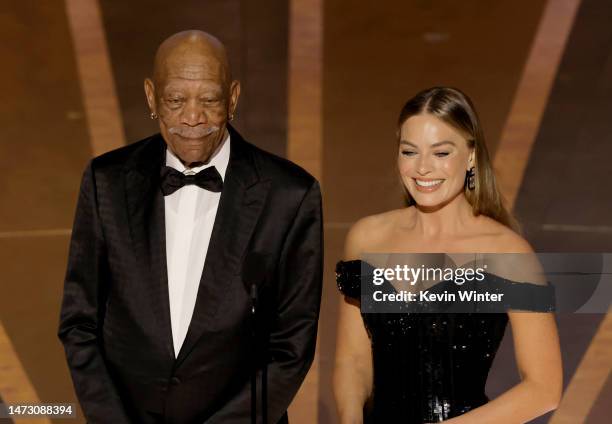 Morgan Freeman and Margot Robbie speak onstage during the 95th Annual Academy Awards at Dolby Theatre on March 12, 2023 in Hollywood, California.