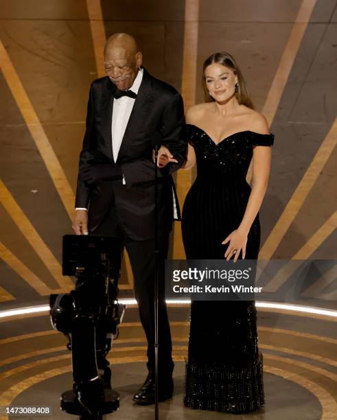 Morgan Freeman and Margot Robbie speak onstage during the 95th Annual Academy Awards at Dolby Theatre on March 12, 2023 in Hollywood, California.
