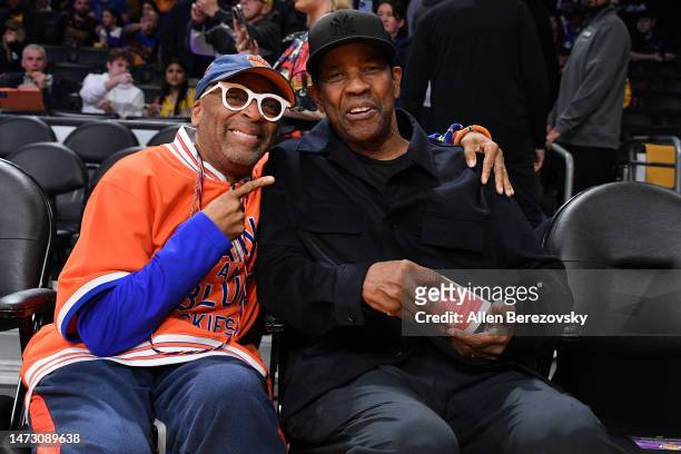 Spike Lee and Denzel Washington attend a basketball game between the Los Angeles Lakers and the New York Knicks at Crypto.com Arena on March 12, 2023...