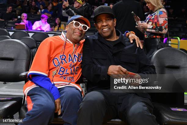 Spike Lee and Denzel Washington attend a basketball game between the Los Angeles Lakers and the New York Knicks at Crypto.com Arena on March 12, 2023...