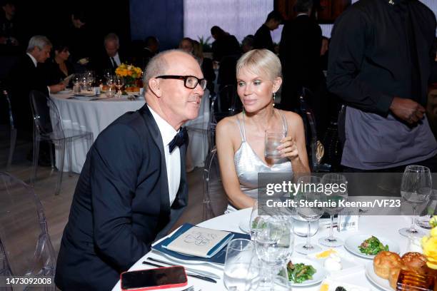 Michael Keaton and Marni Turner attend the 2023 Vanity Fair Oscar Party Hosted By Radhika Jones at Wallis Annenberg Center for the Performing Arts on...