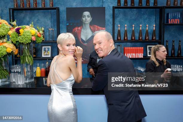 Marni Turner and Michael Keaton attend the 2023 Vanity Fair Oscar Party Hosted By Radhika Jones at Wallis Annenberg Center for the Performing Arts on...