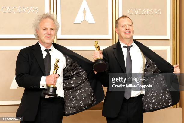 Charlie Mackesy and Matthew Freud, winners of the Best Animated Short Film award for "The Boy, The Mole, The Fox And The Horse," pose in the press...