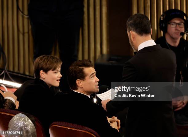 Henry Tadeusz Farrell, Colin Farrell, and host Jimmy Kimmel speak during the 95th Annual Academy Awards at Dolby Theatre on March 12, 2023 in...