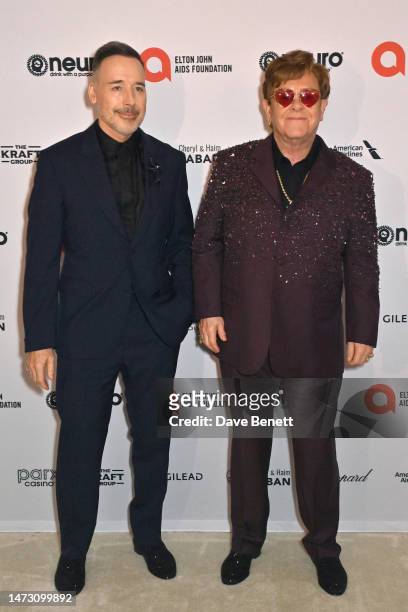 David Furnish and Elton John attend the Elton John AIDS Foundation's 31st Annual Academy Awards Viewing Party on March 12, 2023 in West Hollywood,...