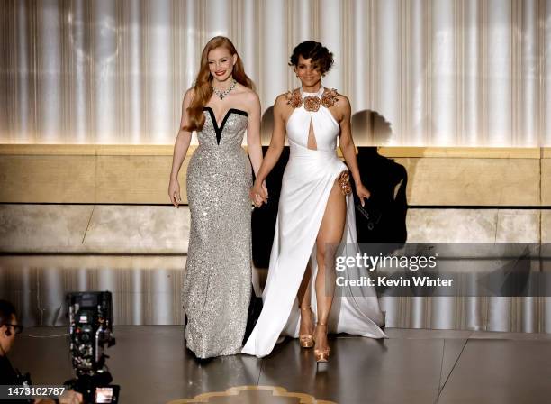 Jessica Chastain and Halle Berry speak onstage during the 95th Annual Academy Awards at Dolby Theatre on March 12, 2023 in Hollywood, California.