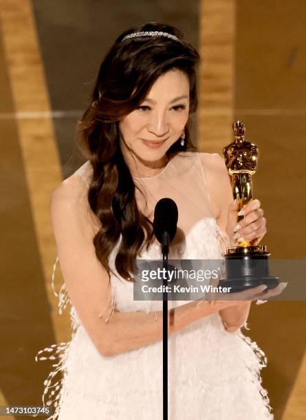 Michelle Yeoh accepts the Best Actress award for "Everything Everywhere All at Once" onstage during the 95th Annual Academy Awards at Dolby Theatre...