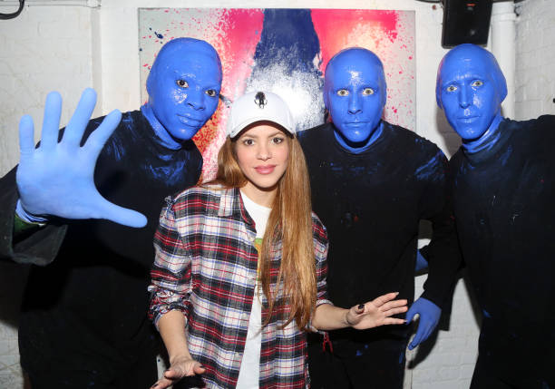 Shakira poses backstage with the Blue Man Group at the iconic show "Blue Man Group" at The Astor Place Theatre on March 12, 2023 in New York City.