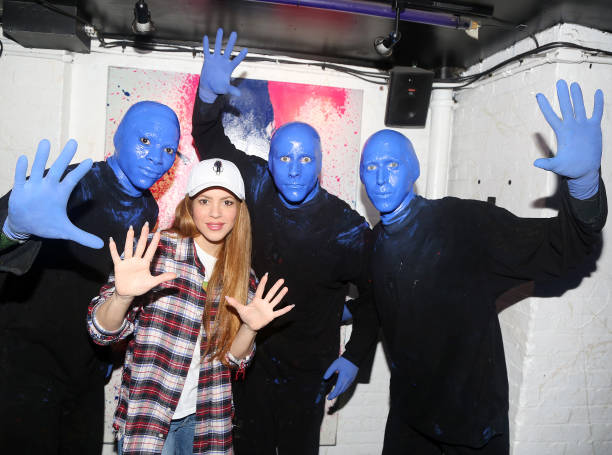 Shakira poses backstage with the Blue Man Group at the iconic show "Blue Man Group" at The Astor Place Theatre on March 12, 2023 in New York City.