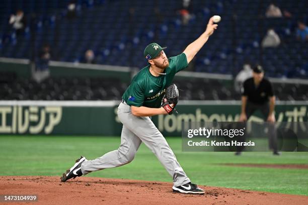 Jack O'Loughlin of Australia throws in the second inning during the World Baseball Classic Pool B game between Australia and Czech Republic at Tokyo...