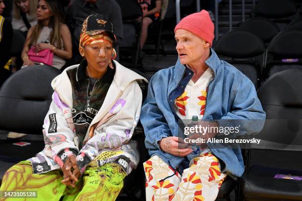 Lauren Halsey and Flea of Red Hot Chili Peppers attends a basketball game between the Los Angeles Lakers and the New York Knicks at Crypto.com Arena...