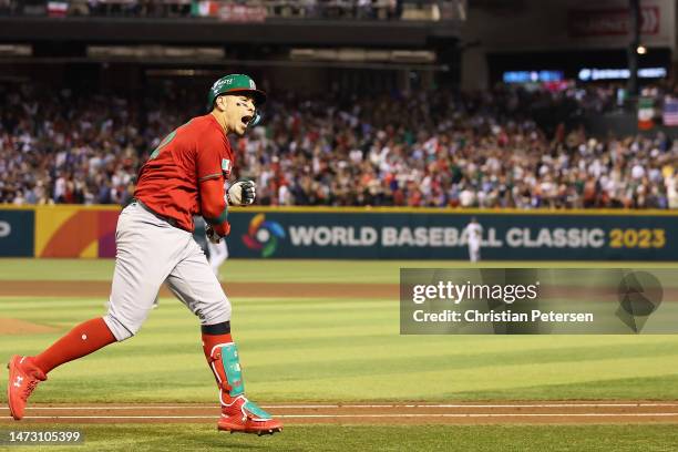Joey Meneses of Team Mexico celebrates after hitting a three-run home run against Team USA during the fourth inning of the World Baseball Classic...