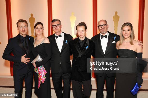 Volker Bertelmann, Edin Hasanovic, guest, Malte Grunert, Felix Kammerer, Edward Berger, and guest attend the 95th Annual Academy Awards on March 12,...