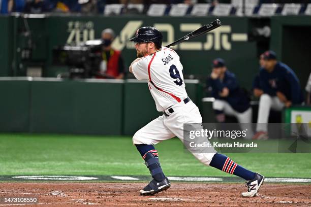 Eric Sogard of the Czech Republic hits a RBI single to make it 1-1 in the third inning during the World Baseball Classic Pool B game between...