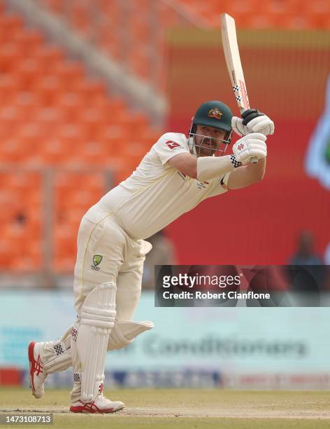 Travis Head of Australia bats during day five of the Fourth Test match in the series between India and Australia at Narendra Modi Stadium on March...