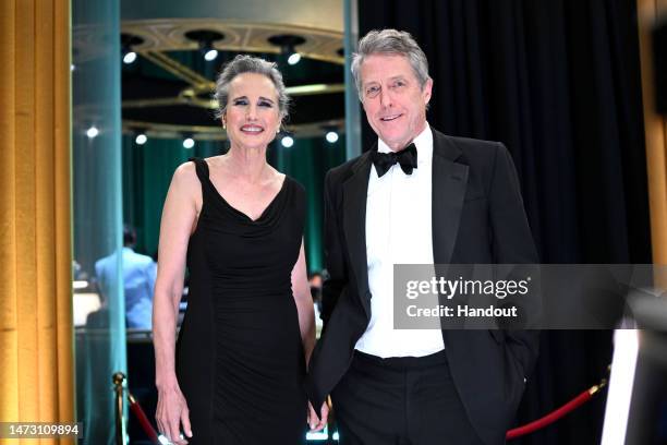 In this handout photo provided by A.M.P.A.S., Andie MacDowell and Hugh Grant are seen backstage during the 95th Annual Academy Awards on March 12,...