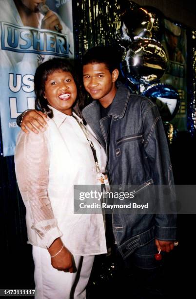 Singer Usher poses for photos with his mother Jonetta Patton during his first annual 'Usher Fan Appreciation Weekend' in Atlanta, Georgia in April...