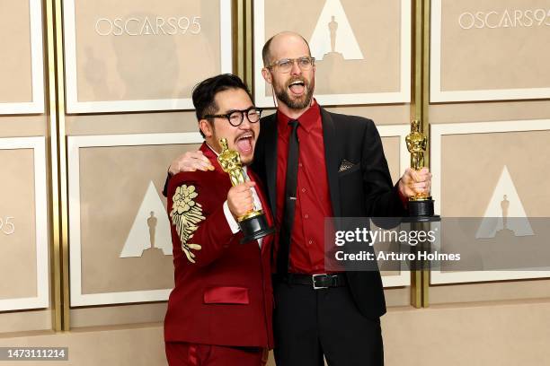 Dan Kwan and Daniel Scheinert, winners of the Best Director and Best Picture award for "Everything Everywhere All at Once," pose in the press room...