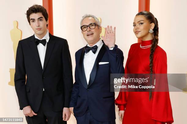 Olmo Teodoro Cuaron, Alfonso Cuarón and Tess Bu Cuarón attend the 95th Annual Academy Awards on March 12, 2023 in Hollywood, California.