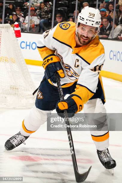 Roman Josi of the Nashville Predators skates with the puck during the third period against the Anaheim Ducks at Honda Center on March 12, 2023 in...