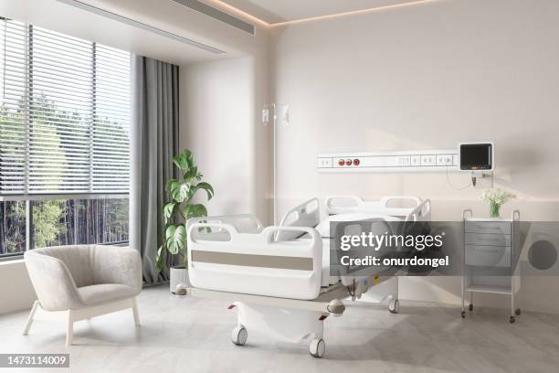 modernes luxus-krankenhauszimmer interieur mit leerem bett, sessel und topfpflanze - krankenstation stock-fotos und bilder