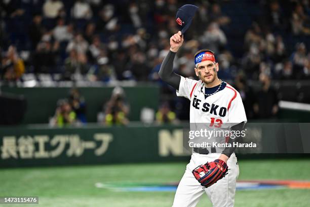 Martin Schneider of the Czech Republic applauds fans as he withdraws in the fifth inning during the World Baseball Classic Pool B game between...