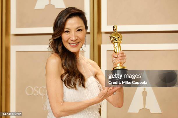 Michelle Yeoh, winner of the Best Actress in a Leading Role award for "Everything Everywhere All at Once," poses in the press room during the 95th...