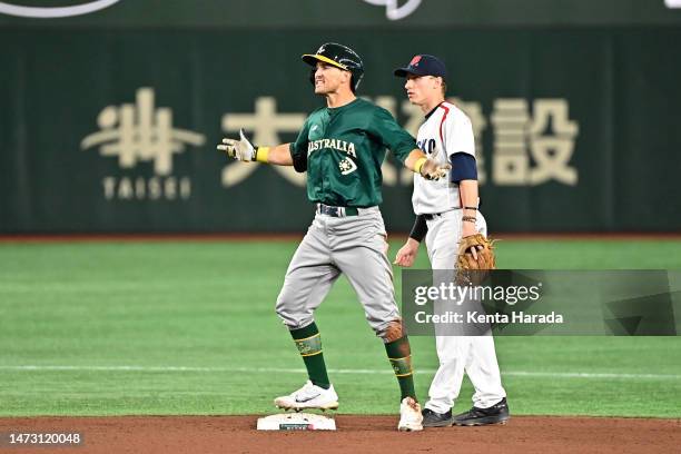 Logan Wade of Australia celebrates hitting a two-run double to make it 3-1 in the seventh inning during the World Baseball Classic Pool B game...