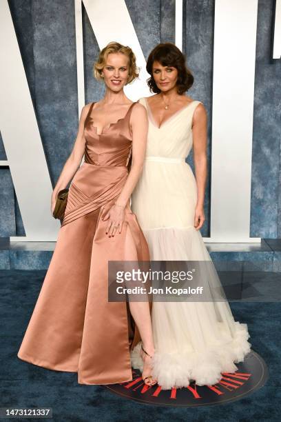 Eva Herzigová and Helena Christensen attend the 2023 Vanity Fair Oscar Party Hosted By Radhika Jones at Wallis Annenberg Center for the Performing...